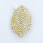 Pearl gold double leaf brooch