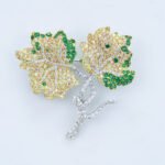 Double gold leaf brooch