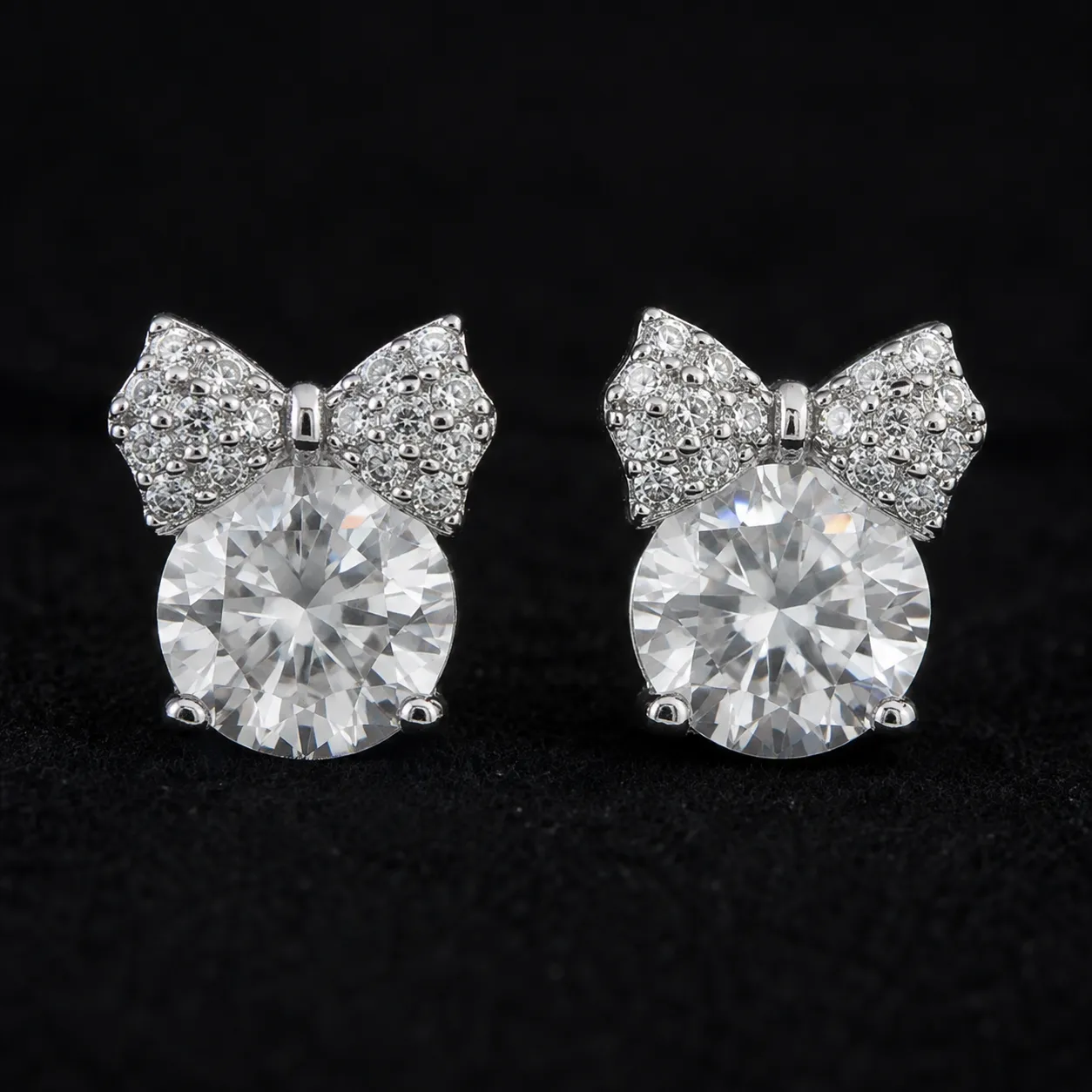 Bow Moissanite Stud Earrings in 925 Sterling Silver Bow Moissanite Stud Earrings in 925 Sterling Silver