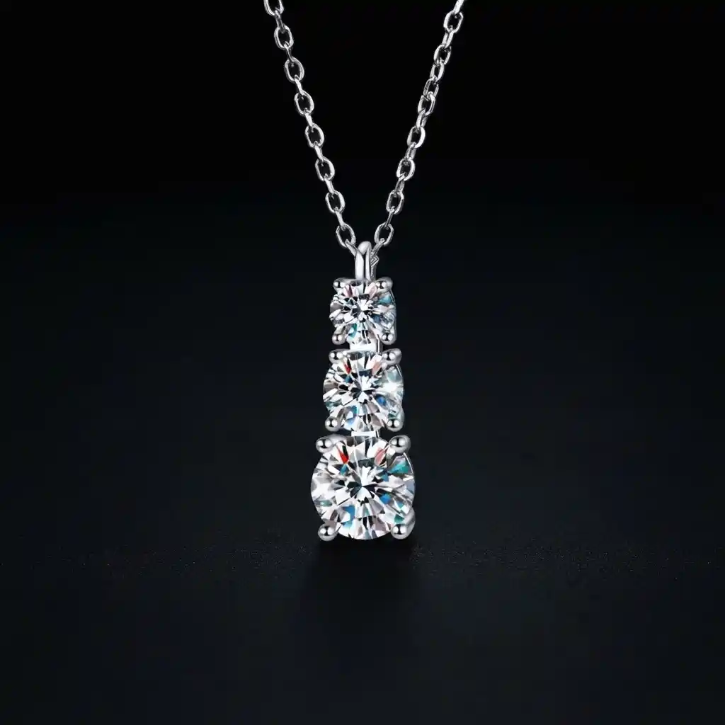 c2872469-147d-49b5-b03a-390efea086f3 Luxury Three Stone Graduated Moissanite Pendant Necklace 925 Silver - Image 1