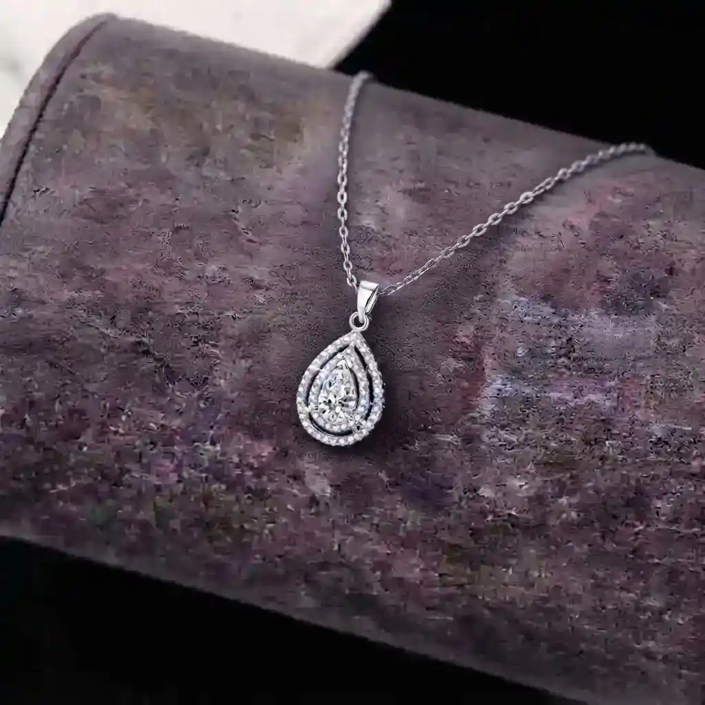 2247f3e4-7cbb-4dee-87f5-31171b088999 Luxury Double Halo Pear Moissanite Pendant Necklace 925 Silver - Image 1