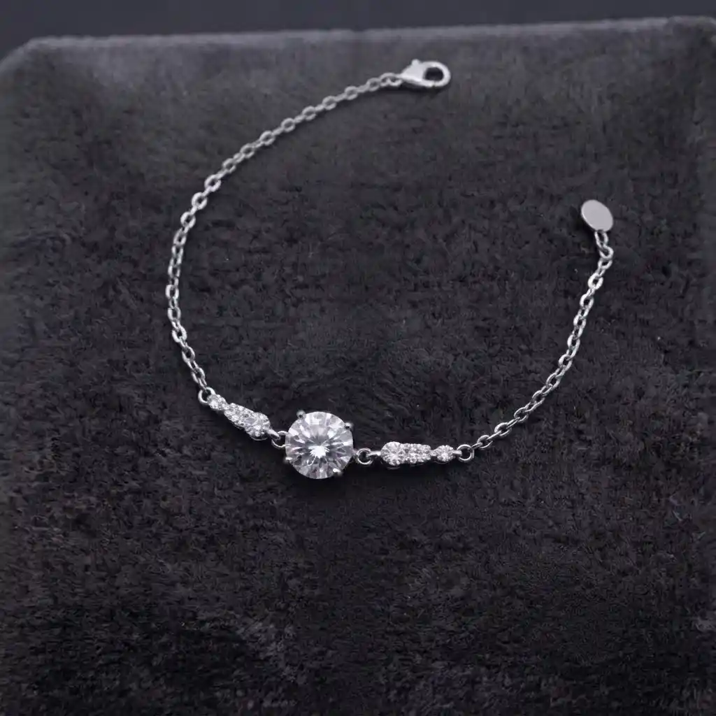 9a0afa56-7ea5-4b2b-be42-79f7ab9b3216 Classic Four Prong Moissanite Charm Bracelet 925 Silver - Image 1